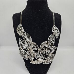 T&R silver tone leaf bib necklace
